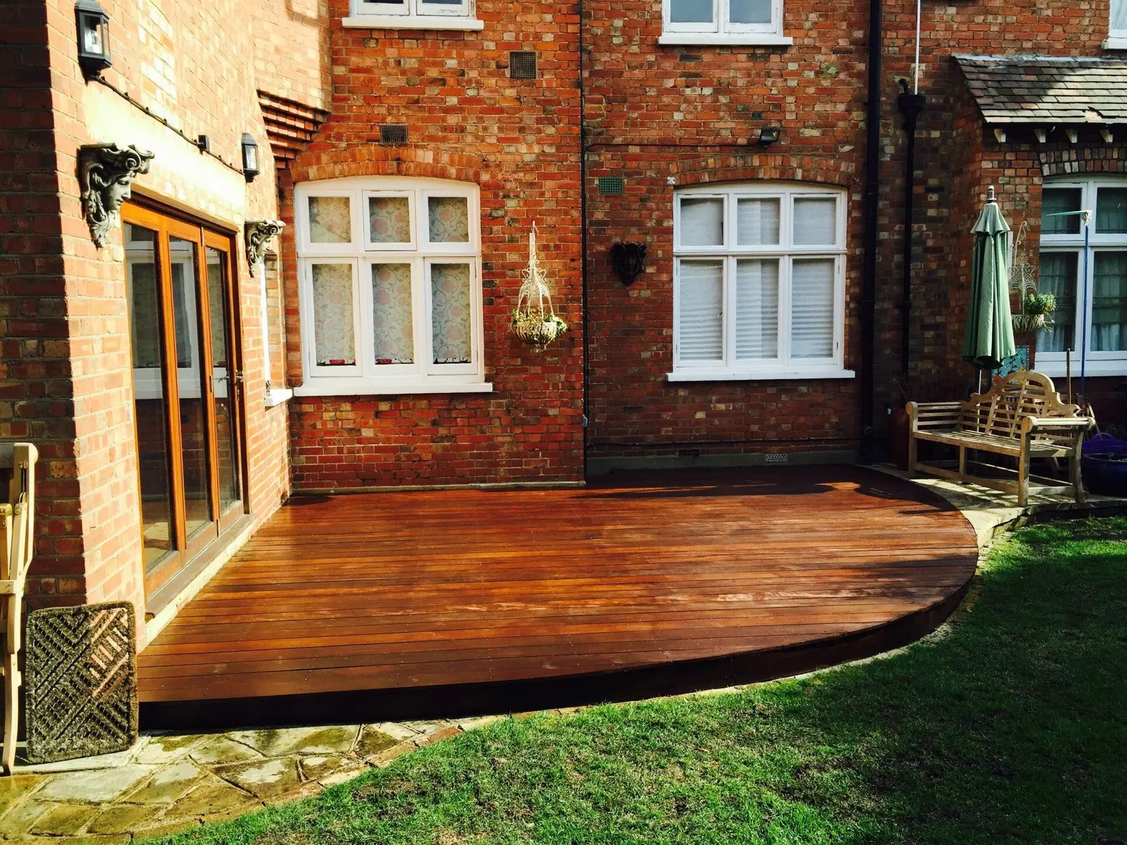 The same decking after pressure washing, back to its natural timber colour